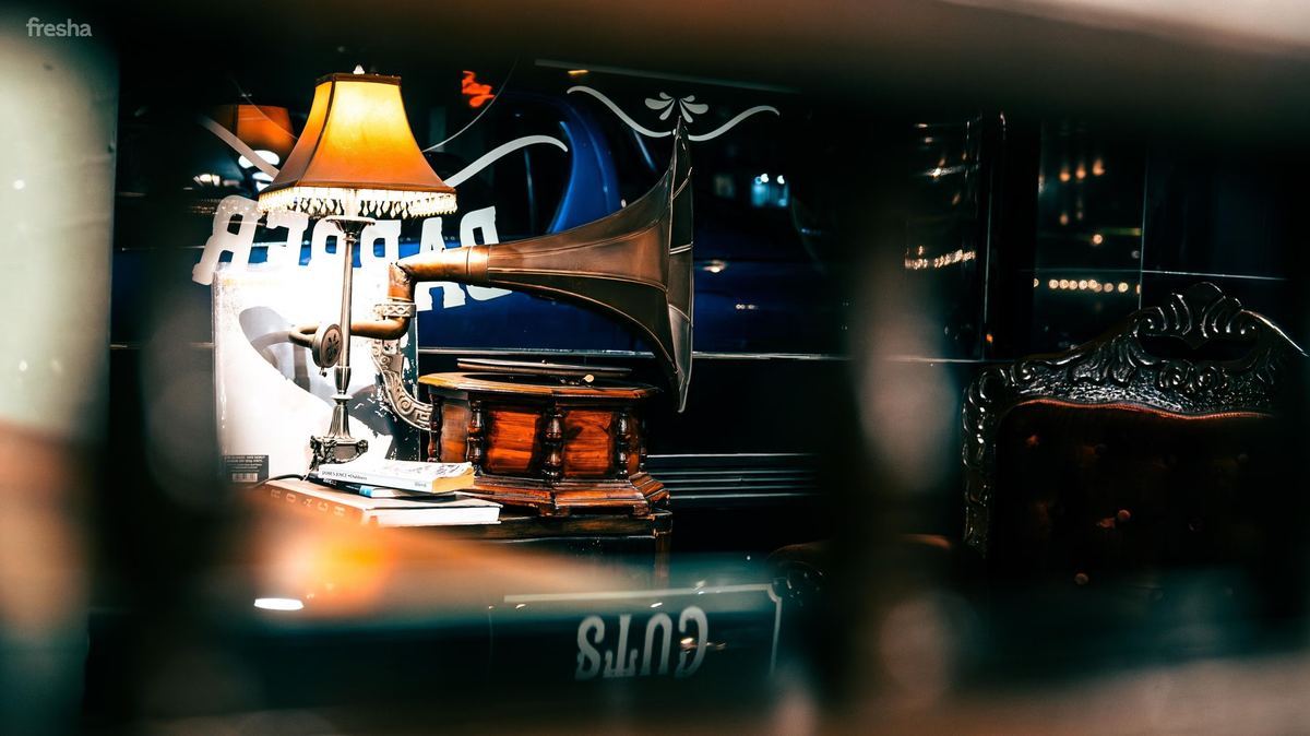 Gramophone and vintage decor at The Blind Stag Barber Malta