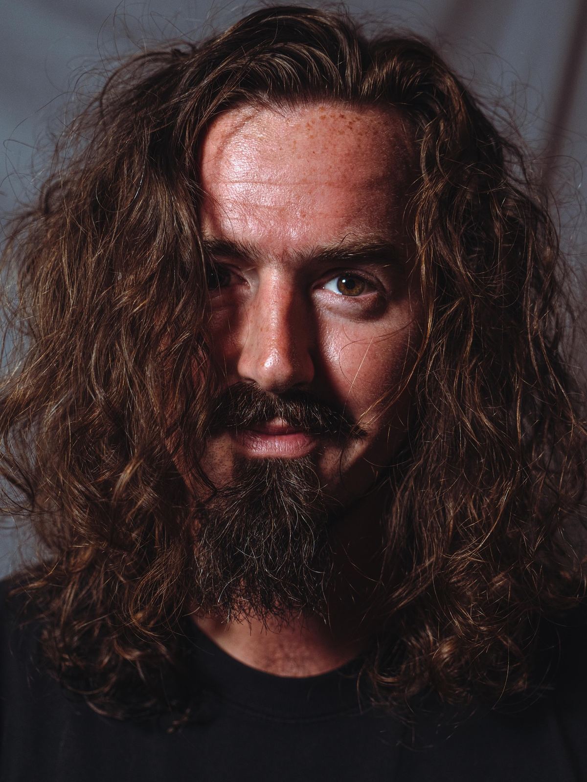 Long hair styling result at The Blind Stag Barber