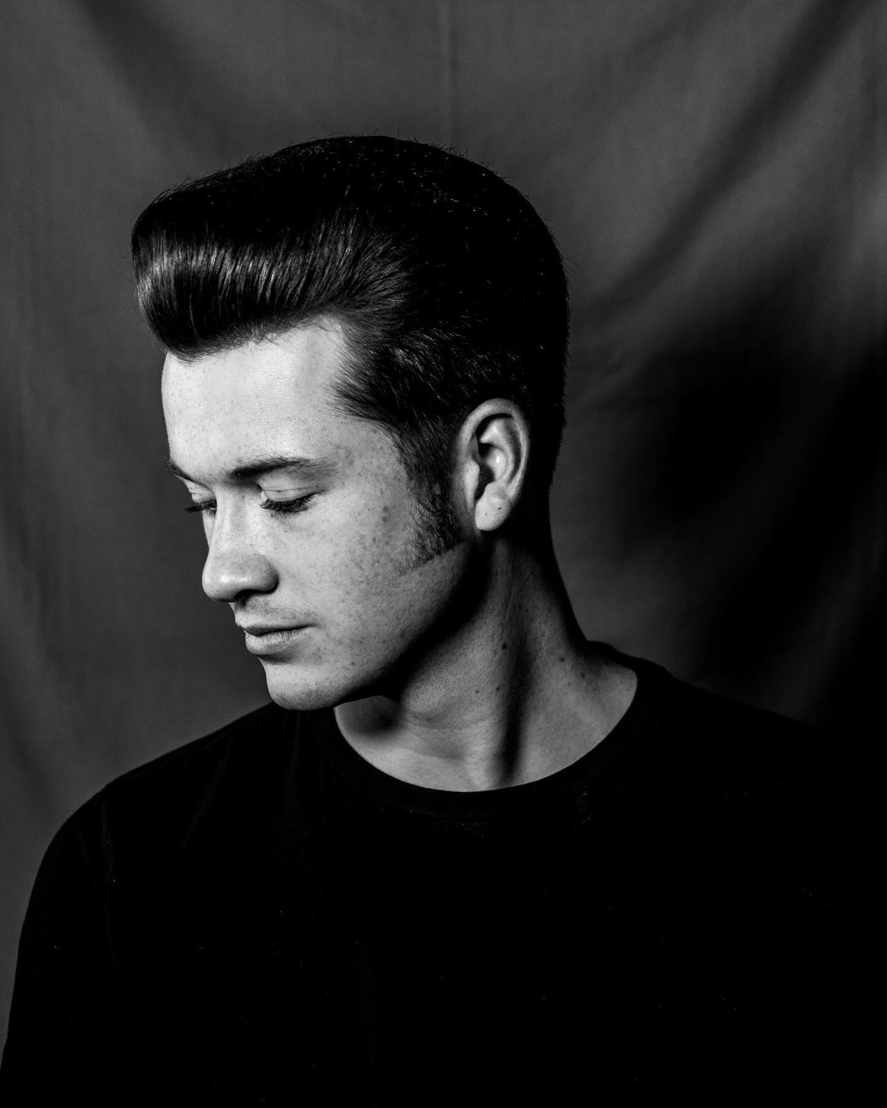 Classic pompadour finish at The Blind Stag Barber