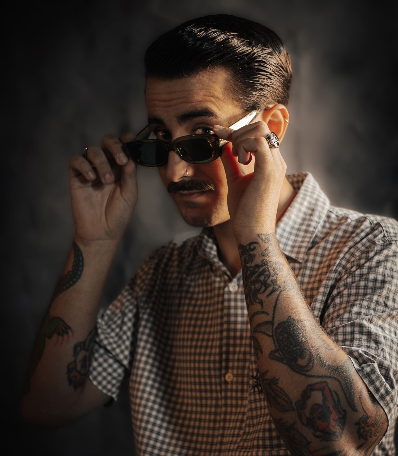 Vintage-style pompadour at The Blind Stag Barber