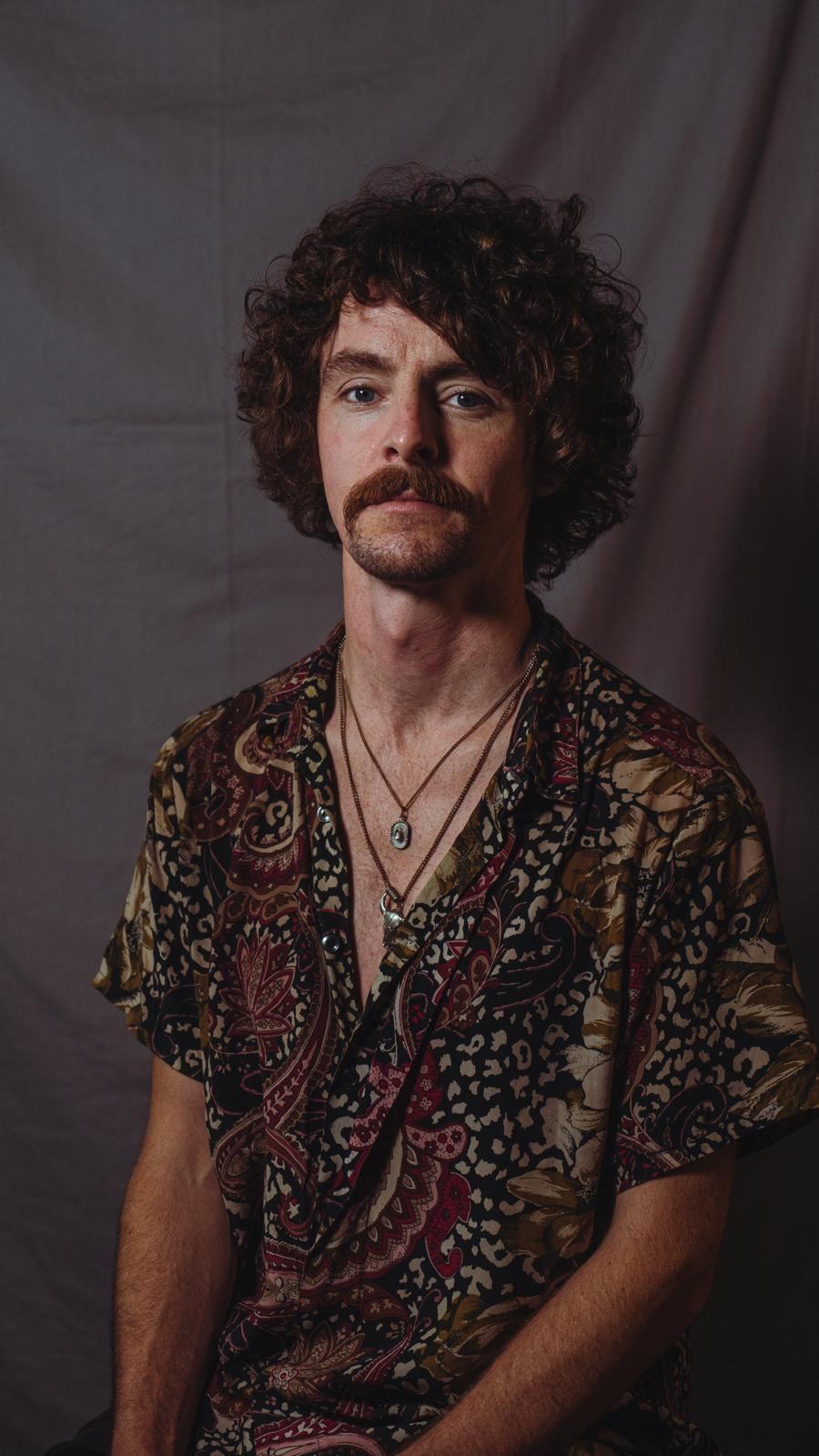 Curly hair styling result at The Blind Stag Barber